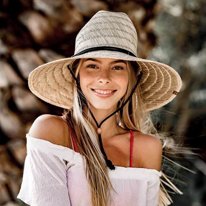 girl wearing custom straw wide brim hat